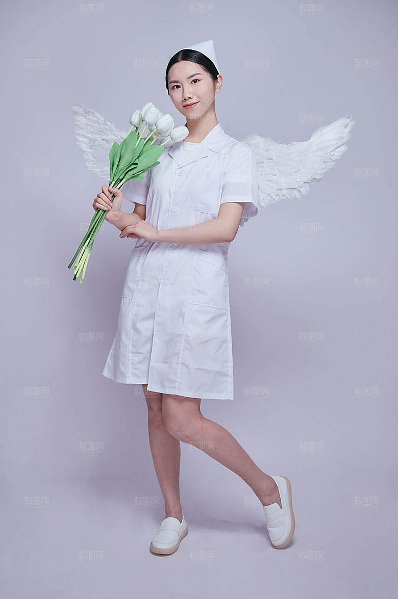 手捧鲜花白衣天使护士摄影图片