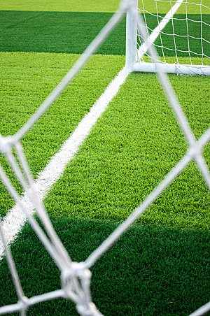 绿色高清足球门网草地摄影图