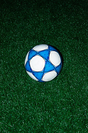 绿色草地夜景足球运动场摄影图