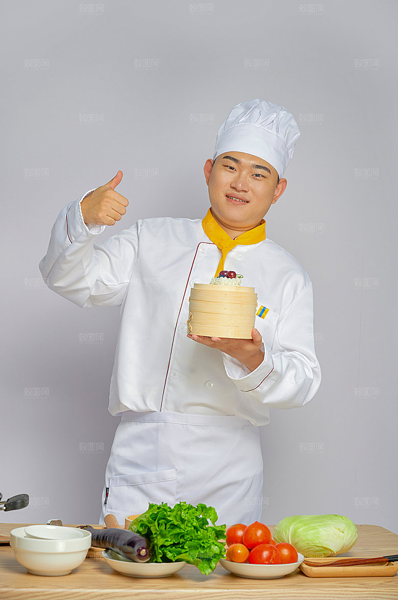 餐饮厨师服人物摄影拿蒸笼图片