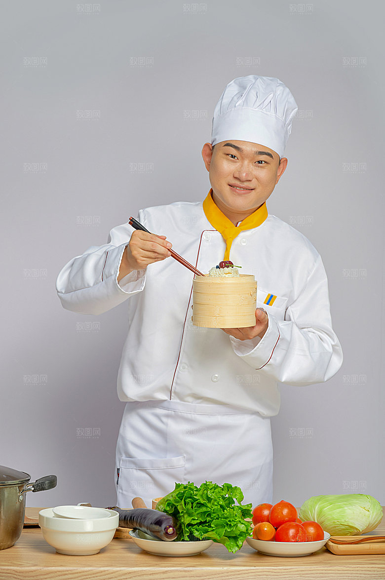 餐饮厨师服人物摄影拿蒸笼图片