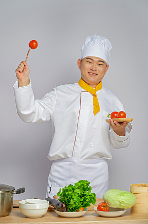 餐饮商业厨师服人物拿番茄摄影