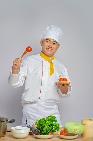 餐饮商业厨师服人物拿番茄图片