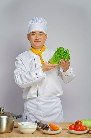 餐饮商业厨师服人物拿蔬菜图片