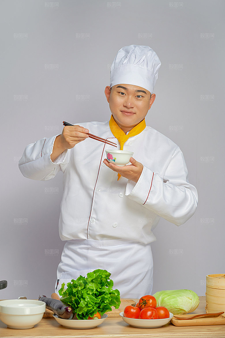餐饮厨师服人物拿蔬菜摄影图