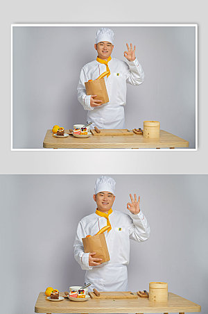 餐饮厨师服人物拿面包图片