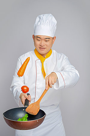 餐饮厨师服人物拿锅勺子摄影图