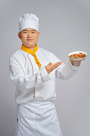 餐饮厨师服人物吃烤鸭摄影图