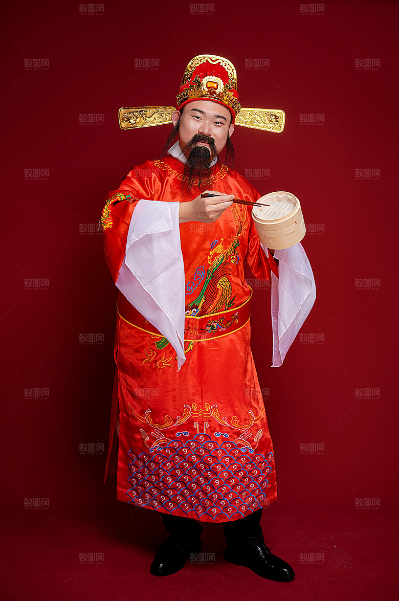国潮新年财神爷手拿小笼包摄影图