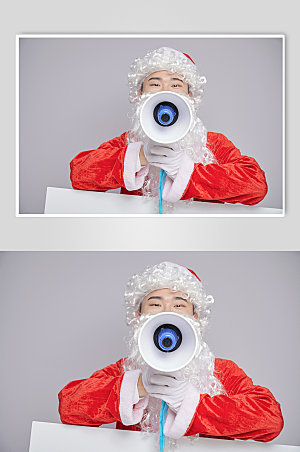 圣诞节圣诞老人手拿喇叭摄影图