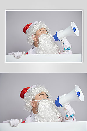 白色背景圣诞老人拿喇叭人物摄影图