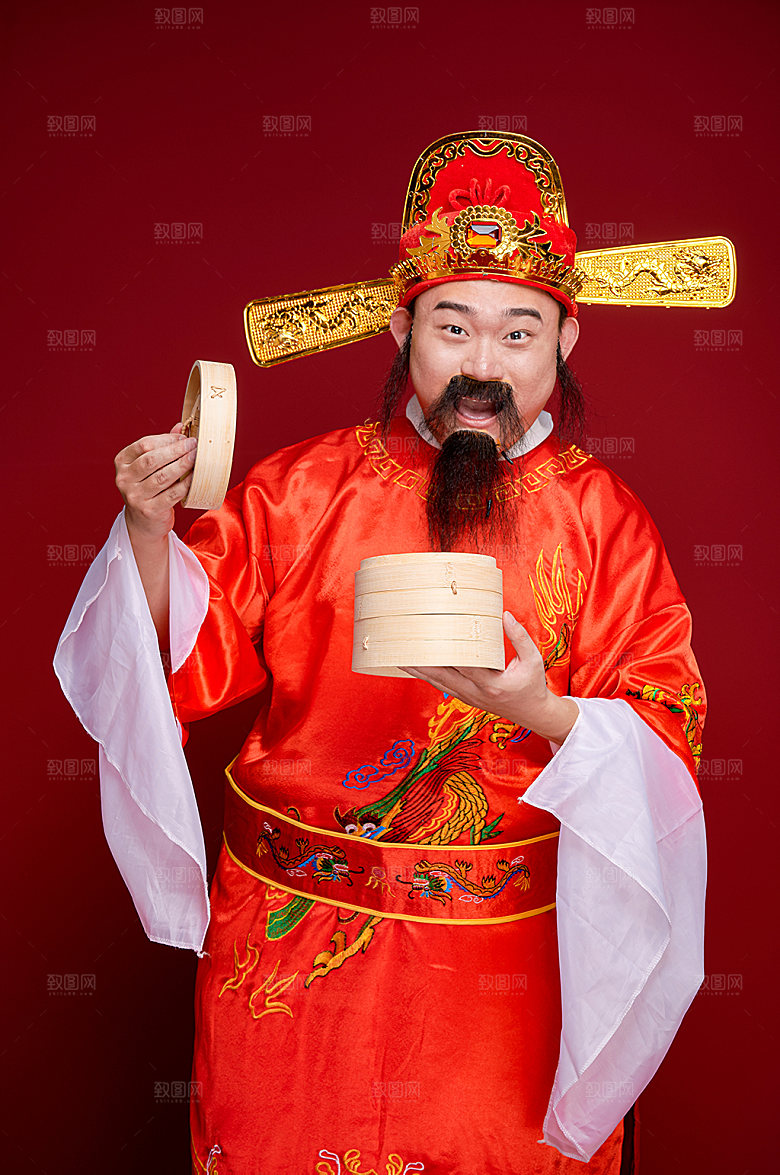 红色新年财神爷端小笼包人物摄影图