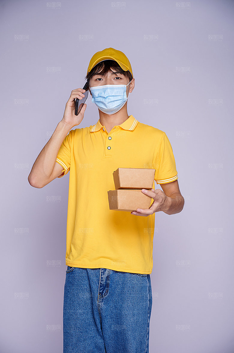 骑手配送员打电话照片摄影图片