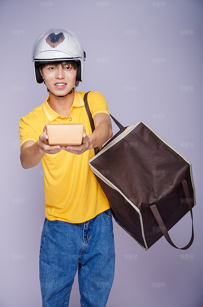 外卖小哥双手递餐商业摄影图片