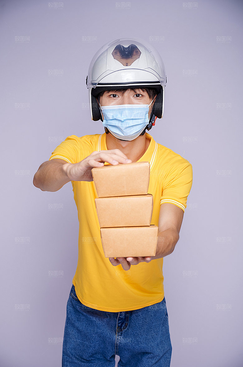外卖小哥弯腰送餐商业摄影图片