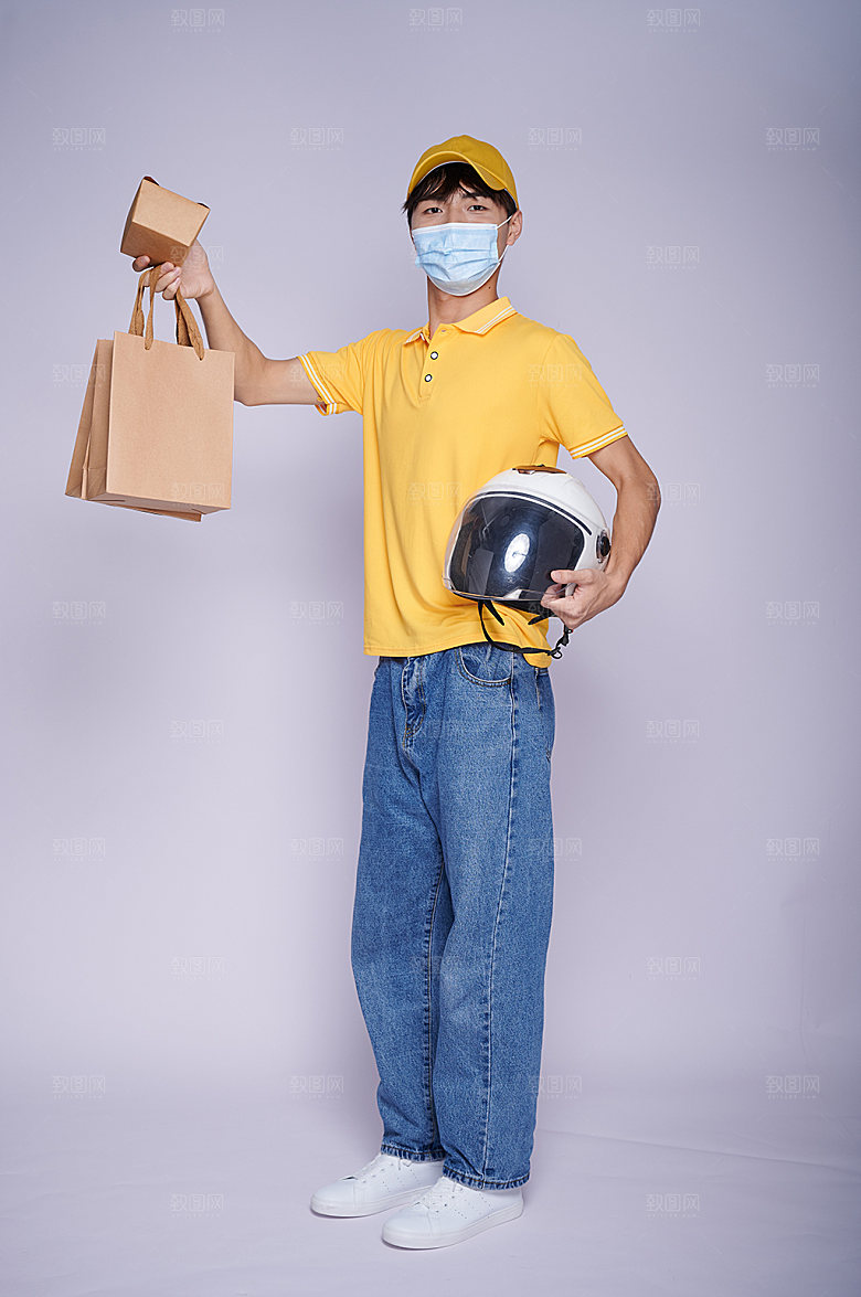 外卖小哥站立送餐商业摄影图片