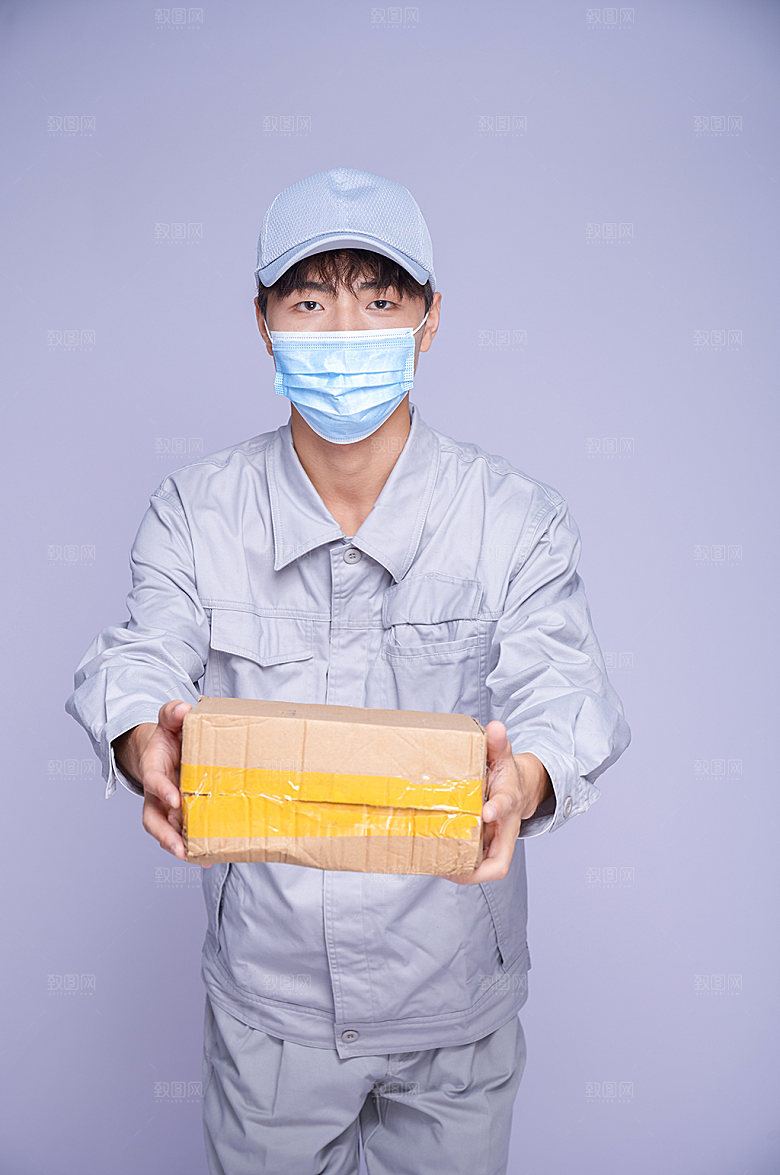 快递配送员戴口罩商业摄影图片