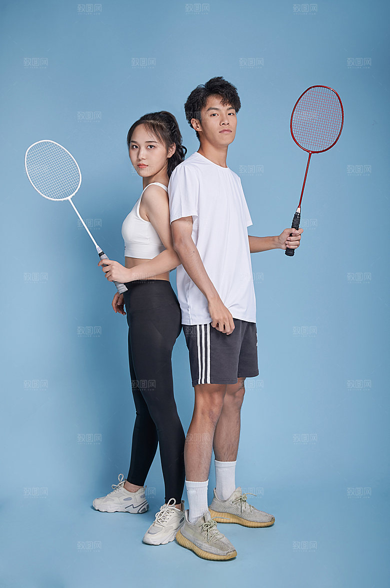 男女打羽毛球运动人物摄影图