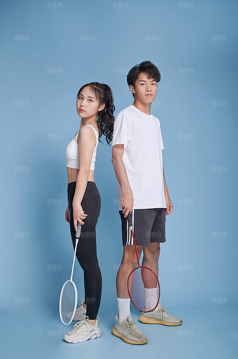男女打羽毛球运动精修摄影图
