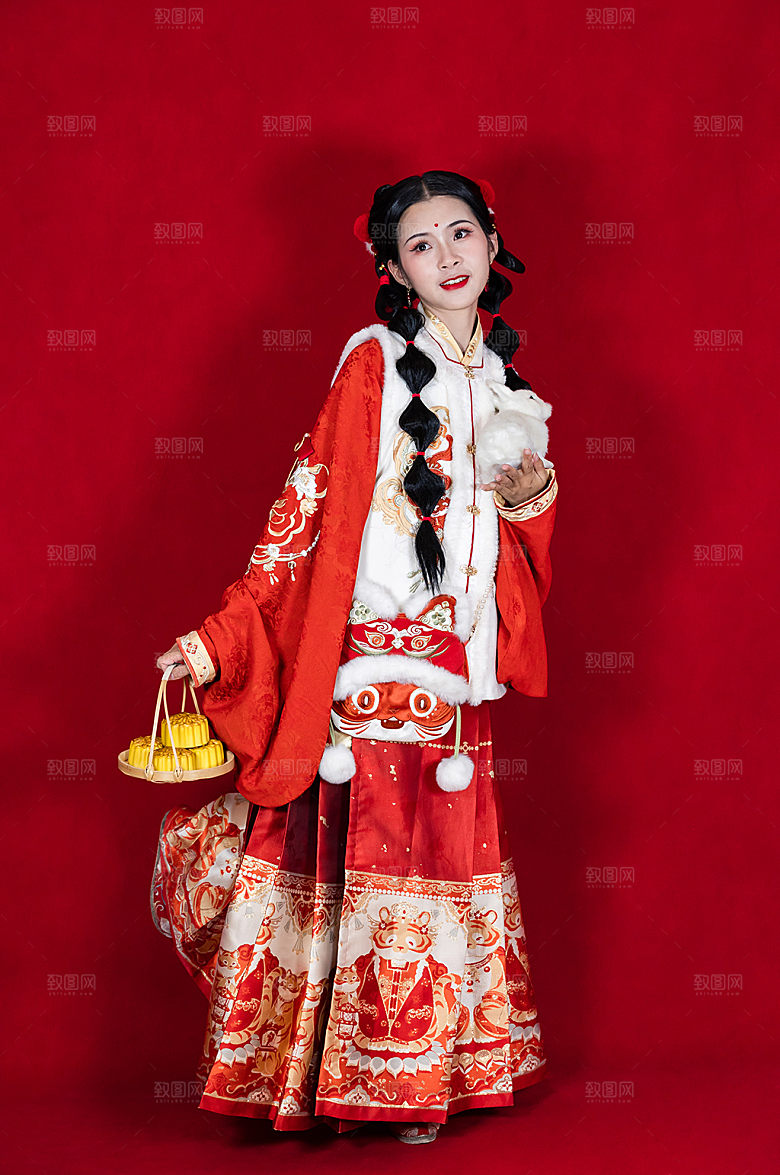 喜庆新年女生月饼玉兔人物商业摄影图