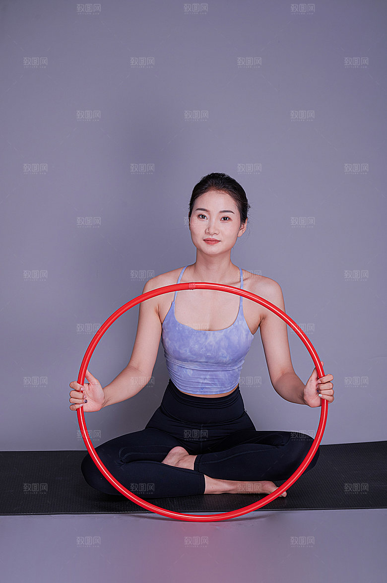 呼啦圈瑜伽锻炼美女人物商用摄影图