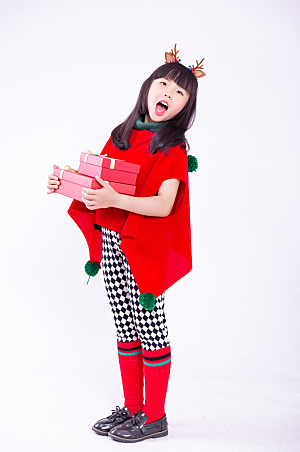 红色抱着礼物盒的圣诞小女孩摄影图图片