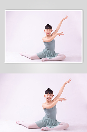 优美可爱坐地上跳芭蕾舞的小女孩