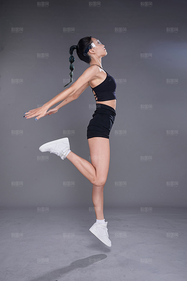 优美健身女热身拉伸摄影图照片
