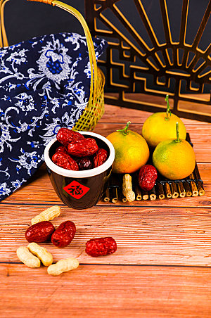 橙子茶具大枣春节背景摄影图片
