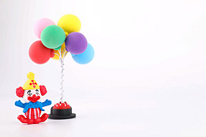 愚人节小丑卡通气球玩具静物摄影图