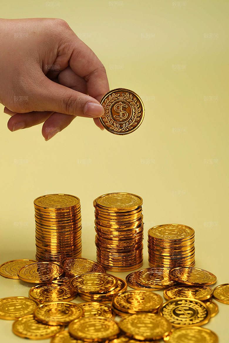 金融手拿金币摄影图