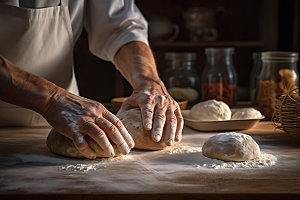 面包制作揉面厨房工作摄影图
