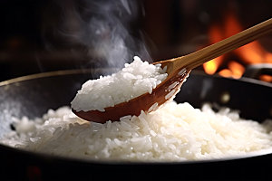 米饭煮饭美食摄影图