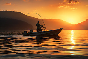 湖边钓鱼自然山谷摄影图