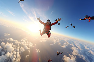 多人跳伞极限运动团队配合摄影图