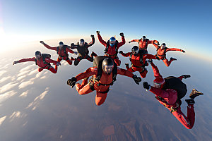 多人跳伞团队协作团队配合摄影图