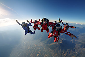 多人跳伞高空运动团队协作摄影图