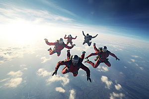 多人跳伞机遇团队配合摄影图