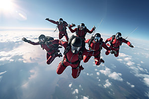 多人跳伞团队配合高空运动摄影图