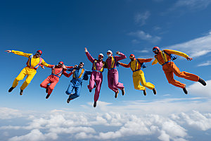 多人跳伞极限运动团队协作摄影图