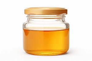 蜂蜜罐高清食品摄影图