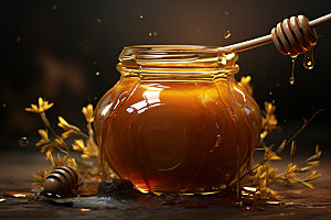 蜂蜜罐甜蜜食品摄影图