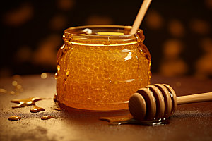 蜂蜜罐甜蜜美食摄影图