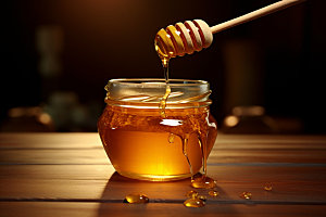 蜂蜜罐甜蜜高清摄影图