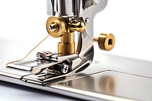 缝纫机剪裁制衣摄影图