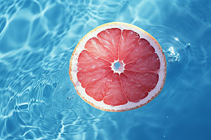 水中柑橘清凉清爽摄影图