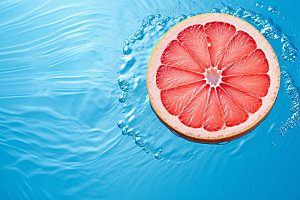 水中柑橘水果清新摄影图