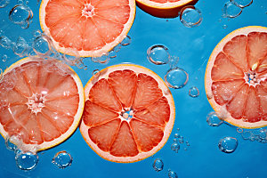 水中柑橘切片创意摄影图