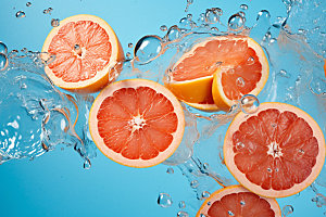 水中柑橘切片夏天摄影图
