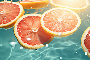水中柑橘西柚柠檬摄影图